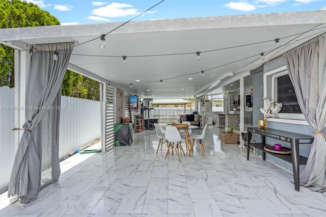view of patio / terrace with fence and outdoor dining space