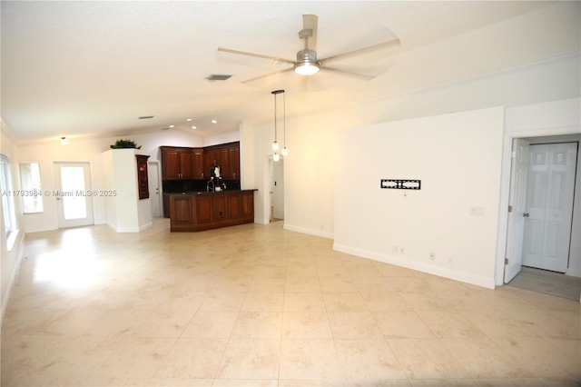 1583 Presidio Dr, Weston, FL 33327 - unfurnished living room with lofted ceiling, a ceiling fan, baseboards, and a sink