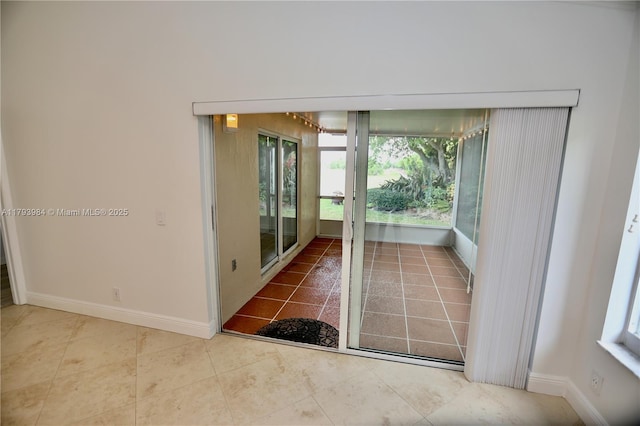 1583 Presidio Dr, Weston, FL 33327 - tiled empty room with baseboards