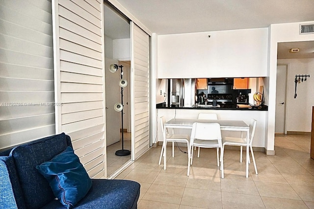 1581 Brickell Ave Unit 1807, Miami, FL 33129 - interior space with visible vents, baseboards, and light tile patterned floors