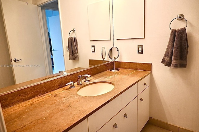 1581 Brickell Ave Unit 1807, Miami, FL 33129 - bathroom with vanity and baseboards