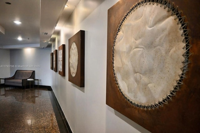 1581 Brickell Ave Unit 1807, Miami, FL 33129 - hall featuring recessed lighting, baseboards, and granite finish floor
