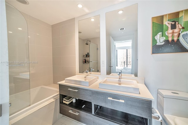 45 SW 9th St Unit 1204, Miami, FL 33130 - ensuite bathroom featuring visible vents, a sink, tile patterned floors, and double vanity