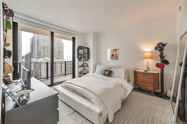 45 SW 9th St Unit 1204, Miami, FL 33130 - bedroom featuring access to outside and baseboards