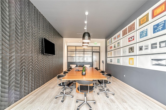 45 SW 9th St Unit 1204, Miami, FL 33130 - office space with wallpapered walls, wood finished floors, and an accent wall