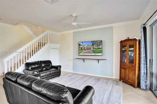 7643 Corkwood Ave, Boynton Beach, FL 33437 - living area with a ceiling fan, ornamental molding, light tile patterned floors, and stairs
