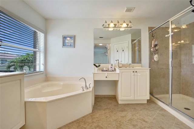 7643 Corkwood Ave, Boynton Beach, FL 33437 - full bathroom featuring a stall shower, a bath, vanity, and tile patterned floors
