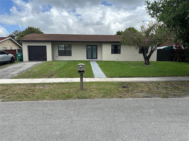 11015 SW 158th Ter, Miami, FL 33157 - ranch-style house featuring french doors, stucco siding, a front yard, and a garage