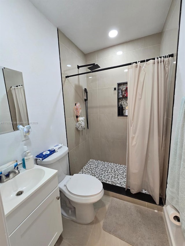 11015 SW 158th Ter, Miami, FL 33157 - bathroom with vanity, tile patterned floors, toilet, and a shower stall