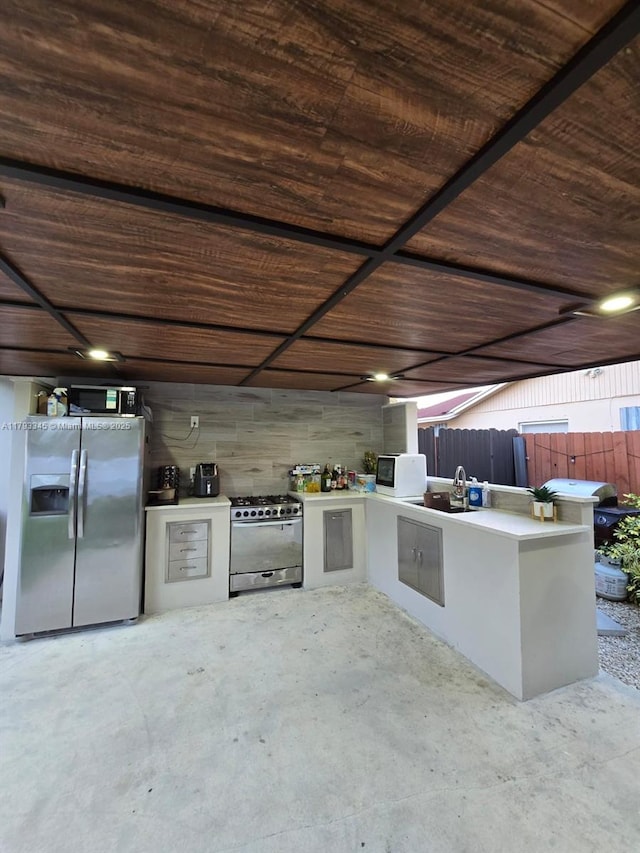 11015 SW 158th Ter, Miami, FL 33157 - view of patio featuring a sink, an outdoor kitchen, and fence