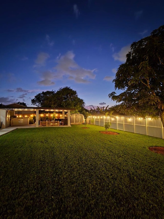 11015 SW 158th Ter, Miami, FL 33157 - yard at dusk featuring fence