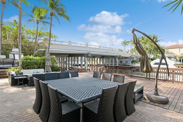 999 N Harbor Vw N, Hollywood, FL 33019 - deck with an outdoor hangout area and outdoor dining space