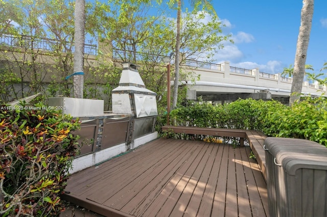 999 N Harbor Vw N, Hollywood, FL 33019 - wooden terrace featuring an outdoor kitchen