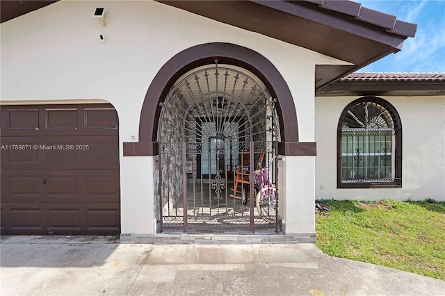 14391 SW 24th St, Miami, FL 33175 - doorway to property with stucco siding