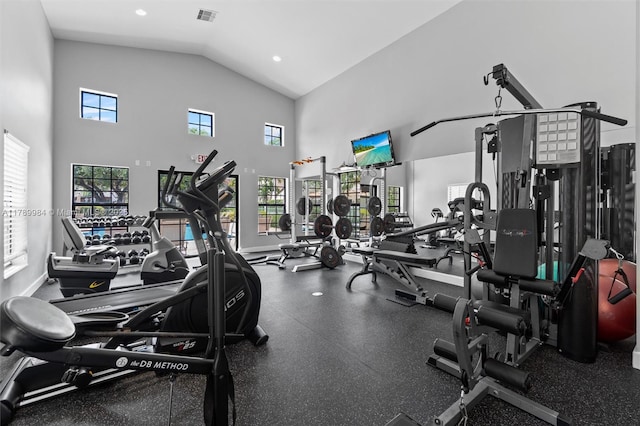 workout area with recessed lighting, high vaulted ceiling, and visible vents