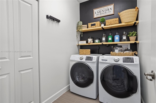 4859 NW 55th Pl, Tamarac, FL 33319 - laundry room featuring washing machine and clothes dryer and baseboards