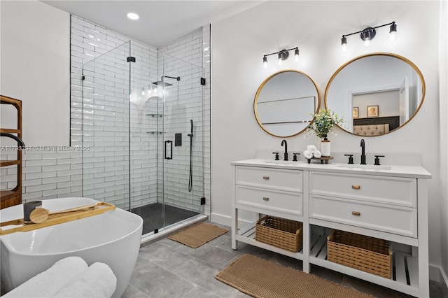 4859 NW 55th Pl, Tamarac, FL 33319 - bathroom featuring a stall shower, a freestanding tub, double vanity, and recessed lighting
