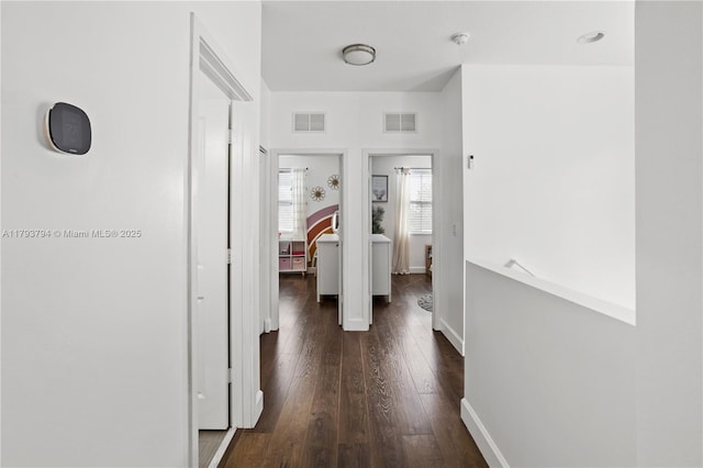 4859 NW 55th Pl, Tamarac, FL 33319 - hallway with dark wood-type flooring and baseboards