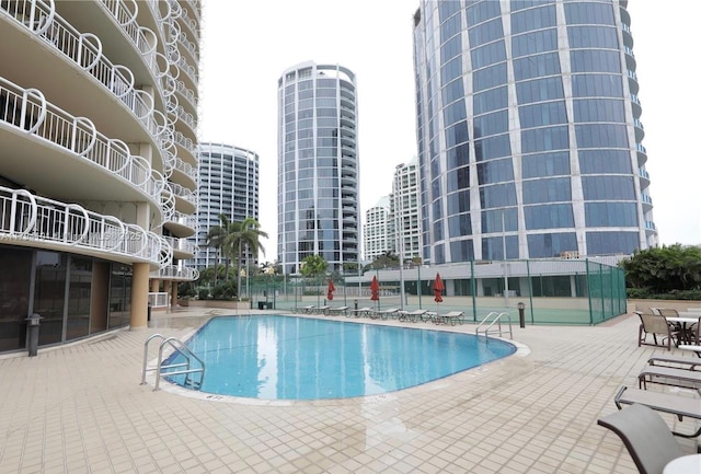 2843 S Bayshore Dr Unit Villa1Villa2, Miami, FL 33133 - community pool with a patio and a view of city