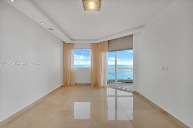 17875 Collins Ave Unit 905, Sunny Isles Beach, FL 33160 - empty room with baseboards, recessed lighting, a water view, and light tile patterned floors