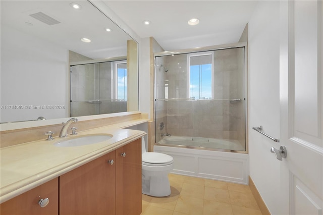 17875 Collins Ave Unit 905, Sunny Isles Beach, FL 33160 - full bath featuring tile patterned flooring, vanity, toilet, combined bath / shower with glass door, and visible vents