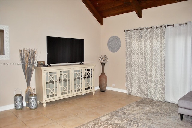 49 Deer Creek Rd Unit E105, Deerfield Beach, FL 33442 - living room featuring vaulted ceiling with beams, baseboards, tile patterned floors, and wooden ceiling