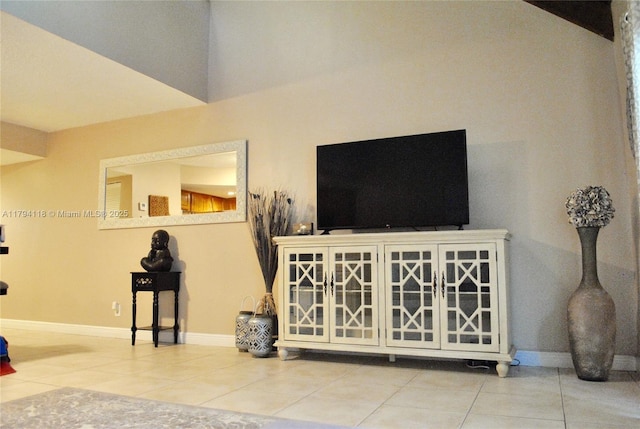 49 Deer Creek Rd Unit E105, Deerfield Beach, FL 33442 - tiled living area with baseboards