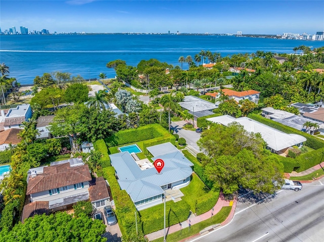 bird's eye view with a water view and a view of city