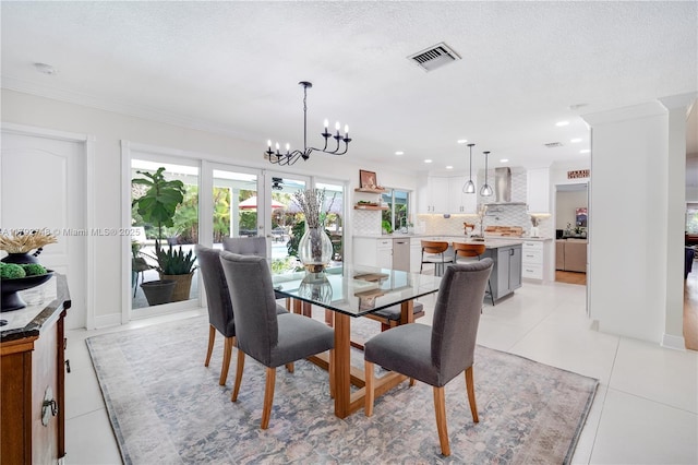 dining room featuring visible vents, ornamental molding, light tile patterned flooring, recessed lighting, and a chandelier