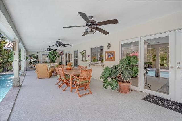 sunroom featuring french doors