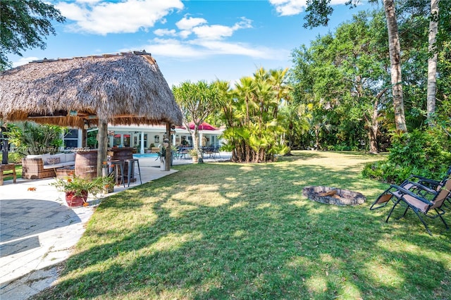 view of yard featuring a patio and an outdoor living space