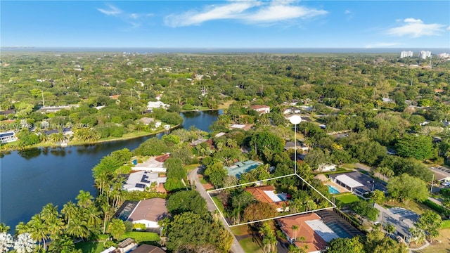 birds eye view of property featuring a water view and a residential view