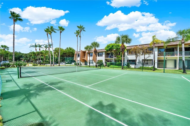 view of sport court with fence