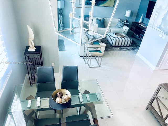 450 N Federal Hwy Unit 102, Boynton Beach, FL 33435 - dining space with baseboards and tile patterned flooring