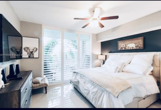 450 N Federal Hwy Unit 102, Boynton Beach, FL 33435 - bedroom featuring access to outside and ceiling fan