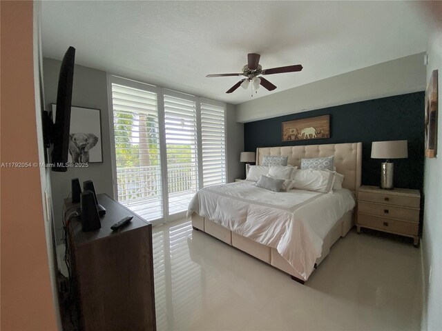 450 N Federal Hwy Unit 102, Boynton Beach, FL 33435 - bedroom with access to outside and ceiling fan