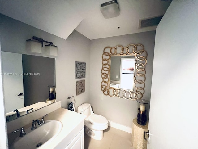 450 N Federal Hwy Unit 102, Boynton Beach, FL 33435 - bathroom with tile patterned flooring, toilet, baseboards, and vanity