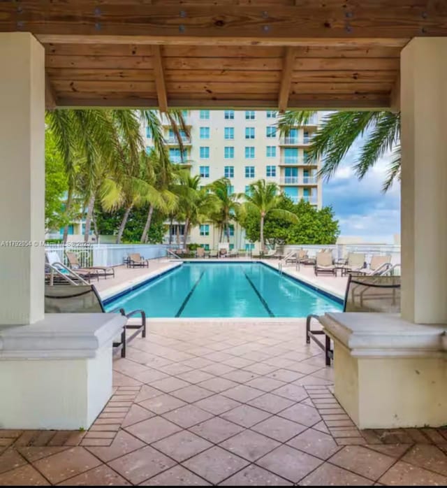450 N Federal Hwy Unit 102, Boynton Beach, FL 33435 - community pool with a patio area and fence
