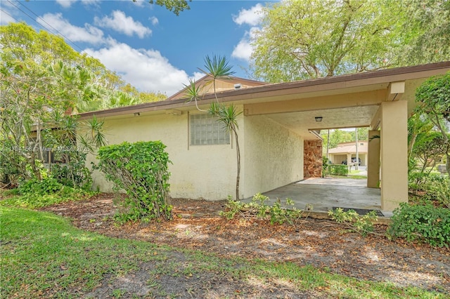 8097 Royal Palm Cir, Tamarac, FL 33321 - view of property exterior with stucco siding
