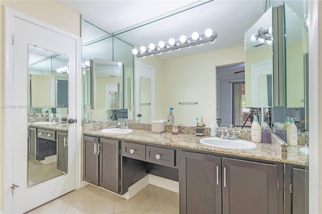8097 Royal Palm Cir, Tamarac, FL 33321 - full bathroom with a sink, tile patterned floors, and double vanity