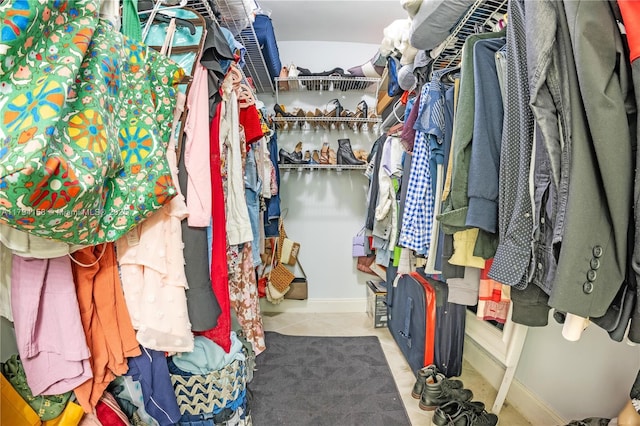 8097 Royal Palm Cir, Tamarac, FL 33321 - spacious closet featuring tile patterned floors