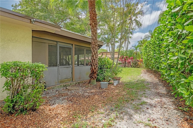 8097 Royal Palm Cir, Tamarac, FL 33321 - view of yard with a sunroom
