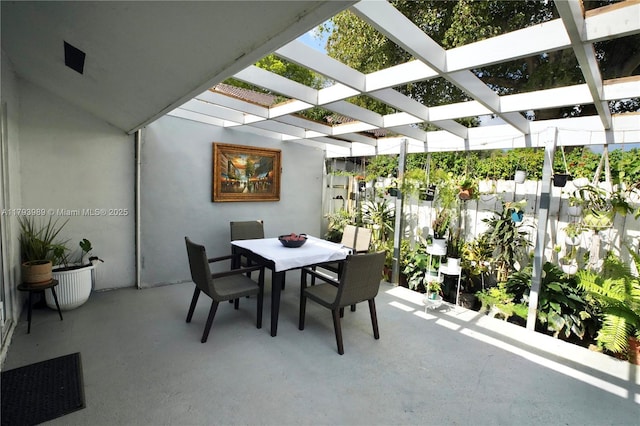 exterior space featuring a skylight and visible vents