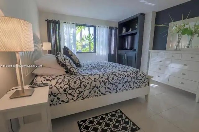 310 Golden Isles Dr Unit 109, Hallandale Beach, FL 33009 - view of tiled bedroom