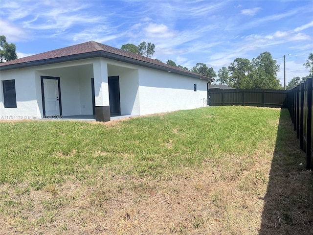 920 E Barton St, Lehigh Acres, FL 33974 - view of property exterior featuring stucco siding