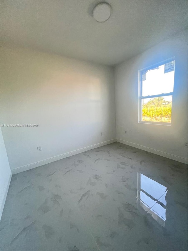 920 E Barton St, Lehigh Acres, FL 33974 - empty room with baseboards