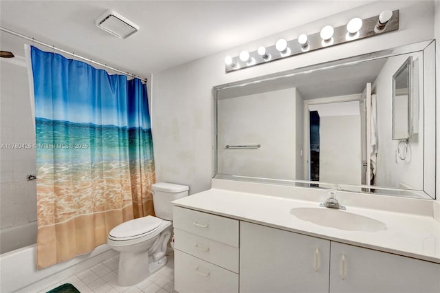 full bathroom featuring tile patterned flooring, shower / tub combo with curtain, toilet, and vanity
