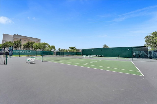 view of sport court with fence and community basketball court