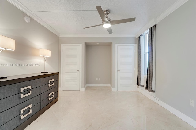 unfurnished bedroom with baseboards, ornamental molding, a textured ceiling, and ceiling fan