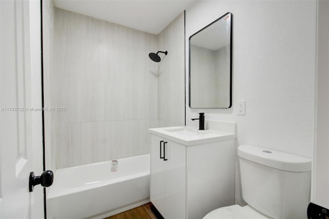 full bathroom with shower / bathtub combination, toilet, wood finished floors, and vanity
